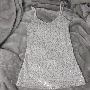 white sequin sleeveless top